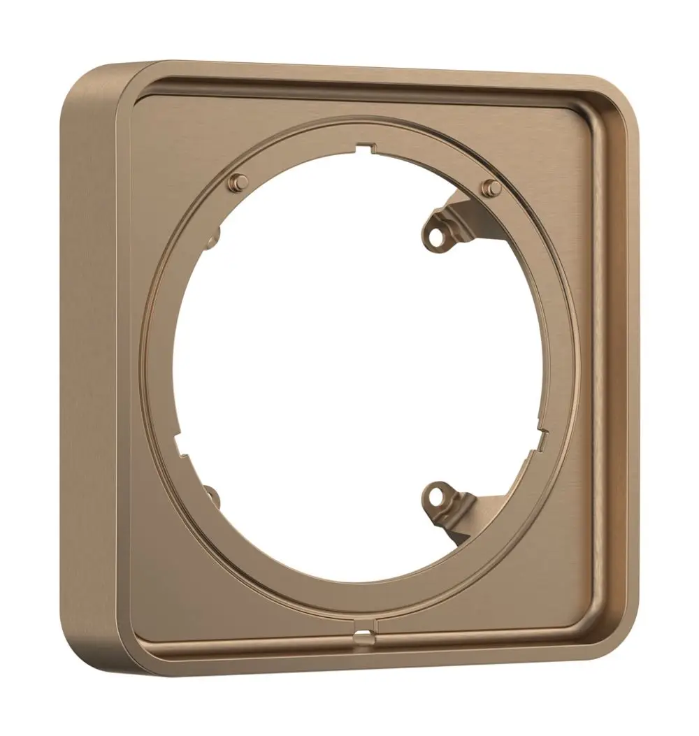 HG Verlängerungsrosette in brushed bronze, rechteckig mit einem runden Ausschnitt in der Mitte und Befestigungselementen. Teil des Hansgrohe Sortimentes zur Erweiterung von Armaturen.